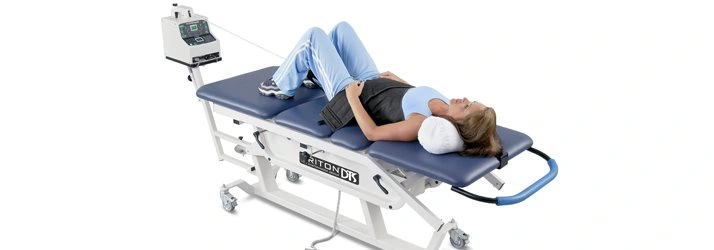 Chiropractic Athens PA Woman On Spinal Decompression Table
